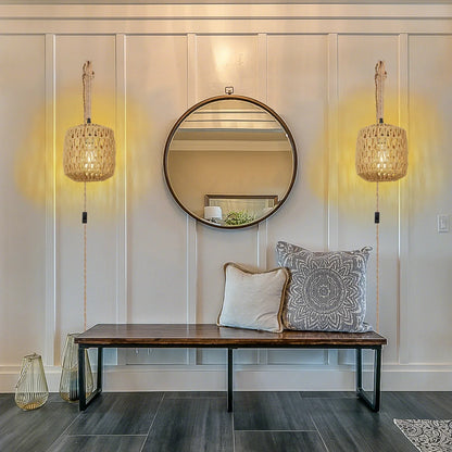 Add a touch of natural élégance to your space with this handcrafted rattan wall lamp. Featuring a woven design and rustic hemp rope accents, it creates a warm, cozy ambiance perfect for bedrooms, living rooms, and bedside l
